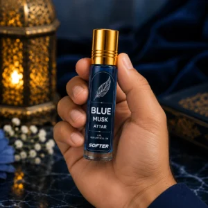 blue musk attar bottle in hand